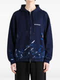 Balenciaga paint-splatter logo-print hoodie
